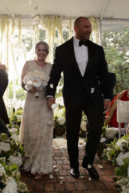 dave bautista and his new bride on wedding day