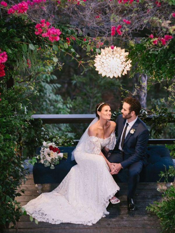 idina menzel with her groom on their wedding day